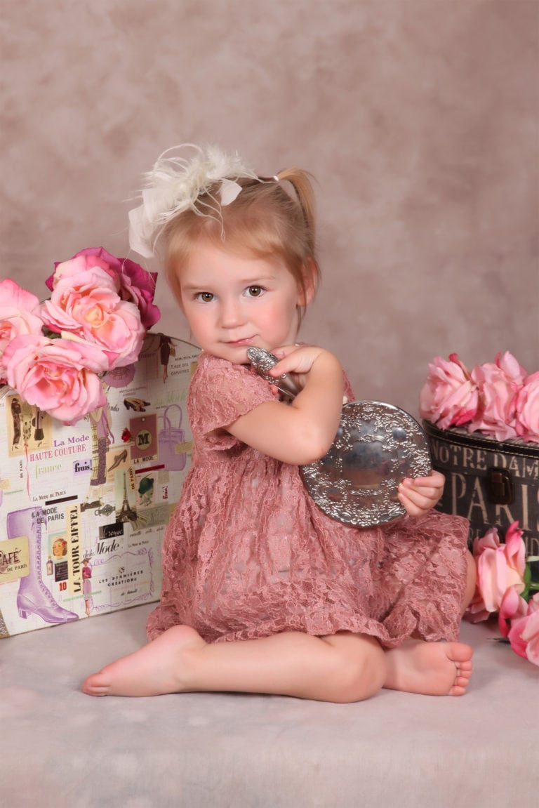 Little Girl Hugging Mirror